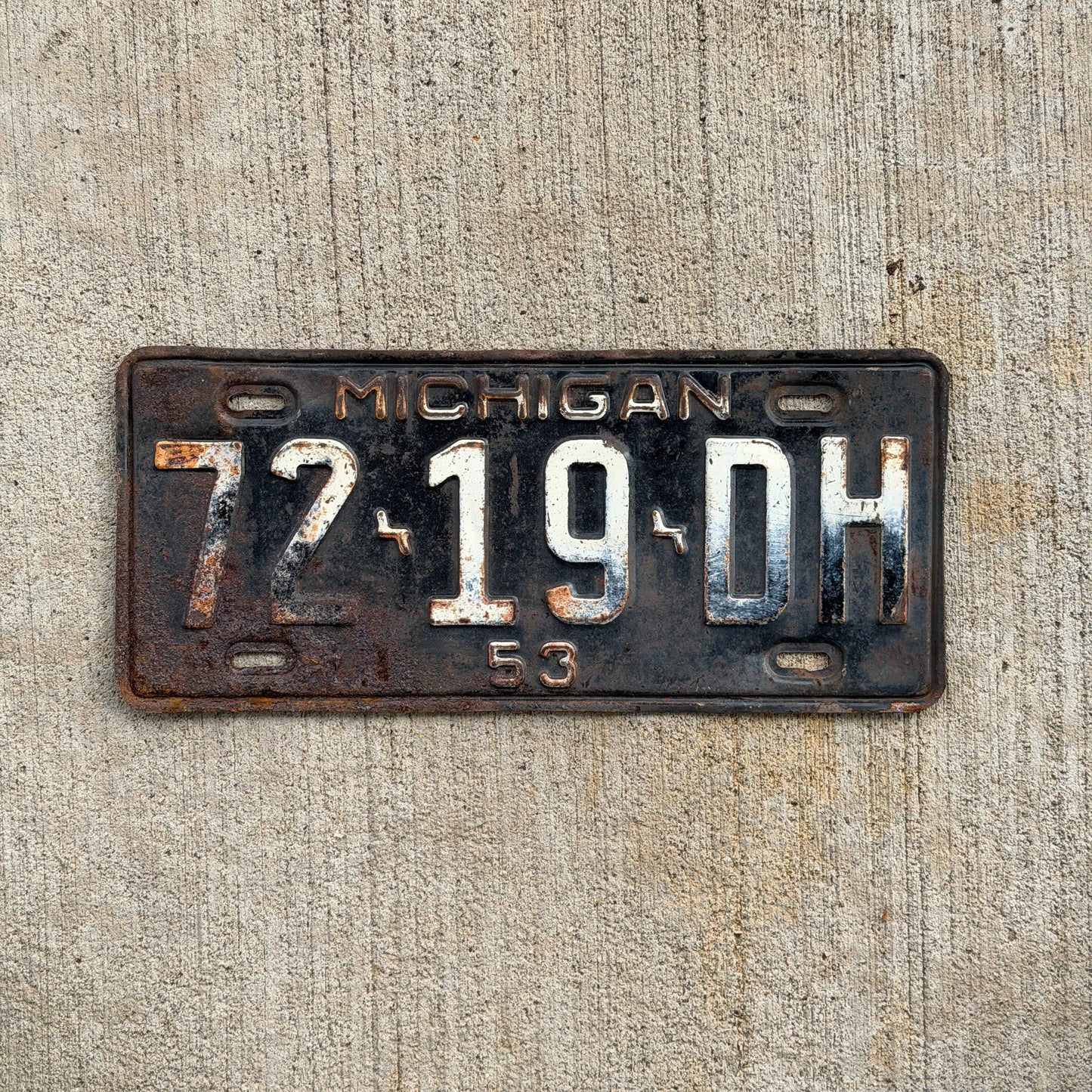 Photo of a 1953 Michigan Commercial License Plate Auto Tag Garage Decor Vintage 72 19 DH with original patina