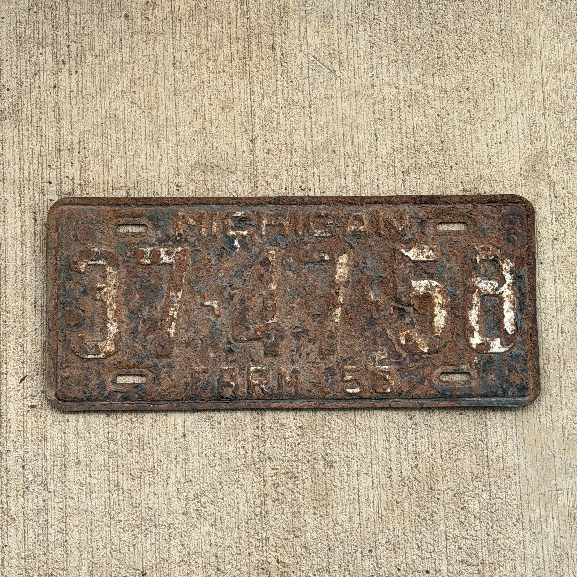 Photo of a 1953 Michigan Farm License Plate Auto Tag Garage Decor Vintage 37 47 58 with original patina