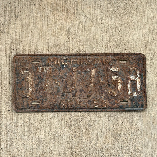 Photo of a 1953 Michigan Farm License Plate Auto Tag Garage Decor Vintage 37 47 58 with original patina