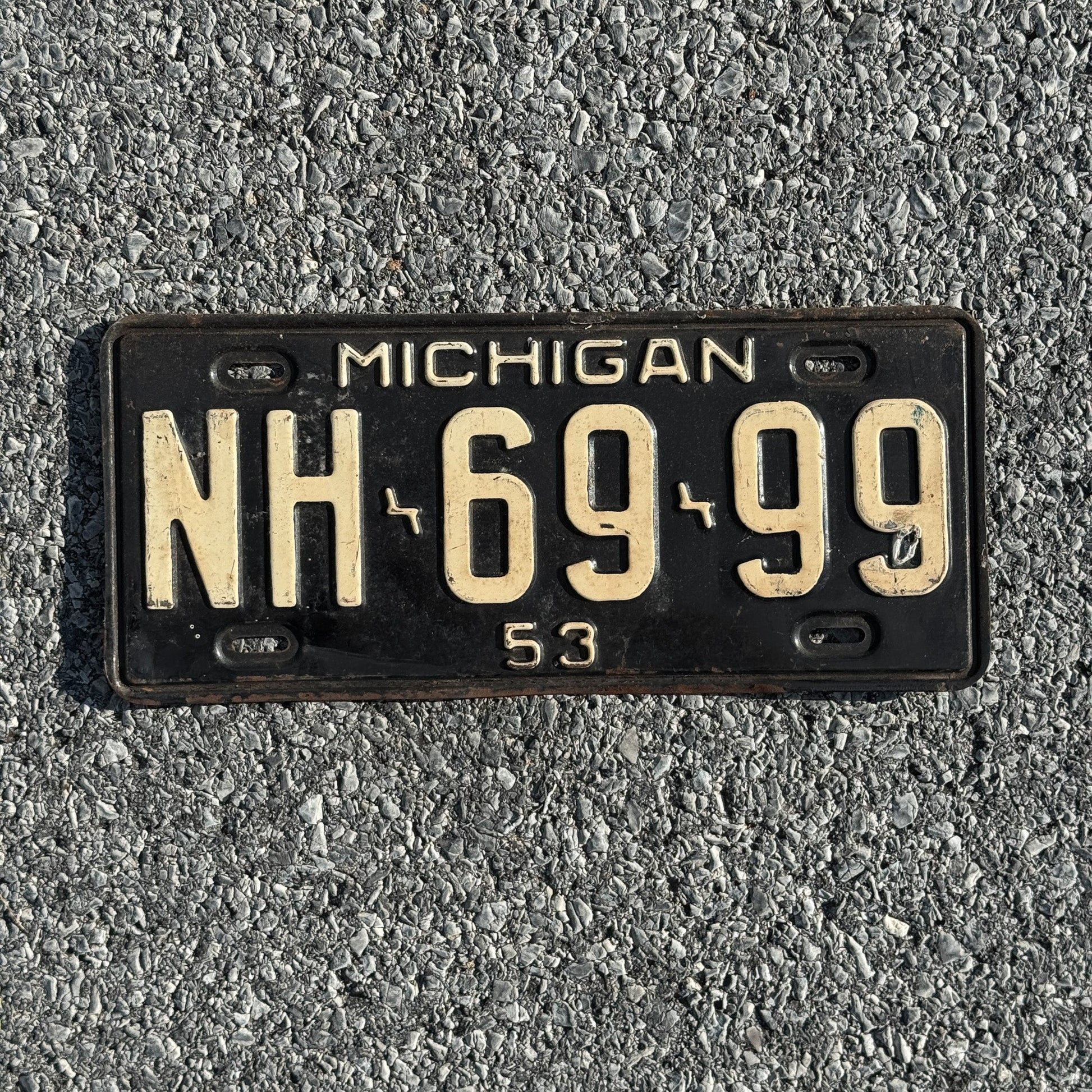 Photo of a 1953 Michigan License Plate Auto Tag Garage Decor Vintage 999 Repeat Repeating NH 6999
