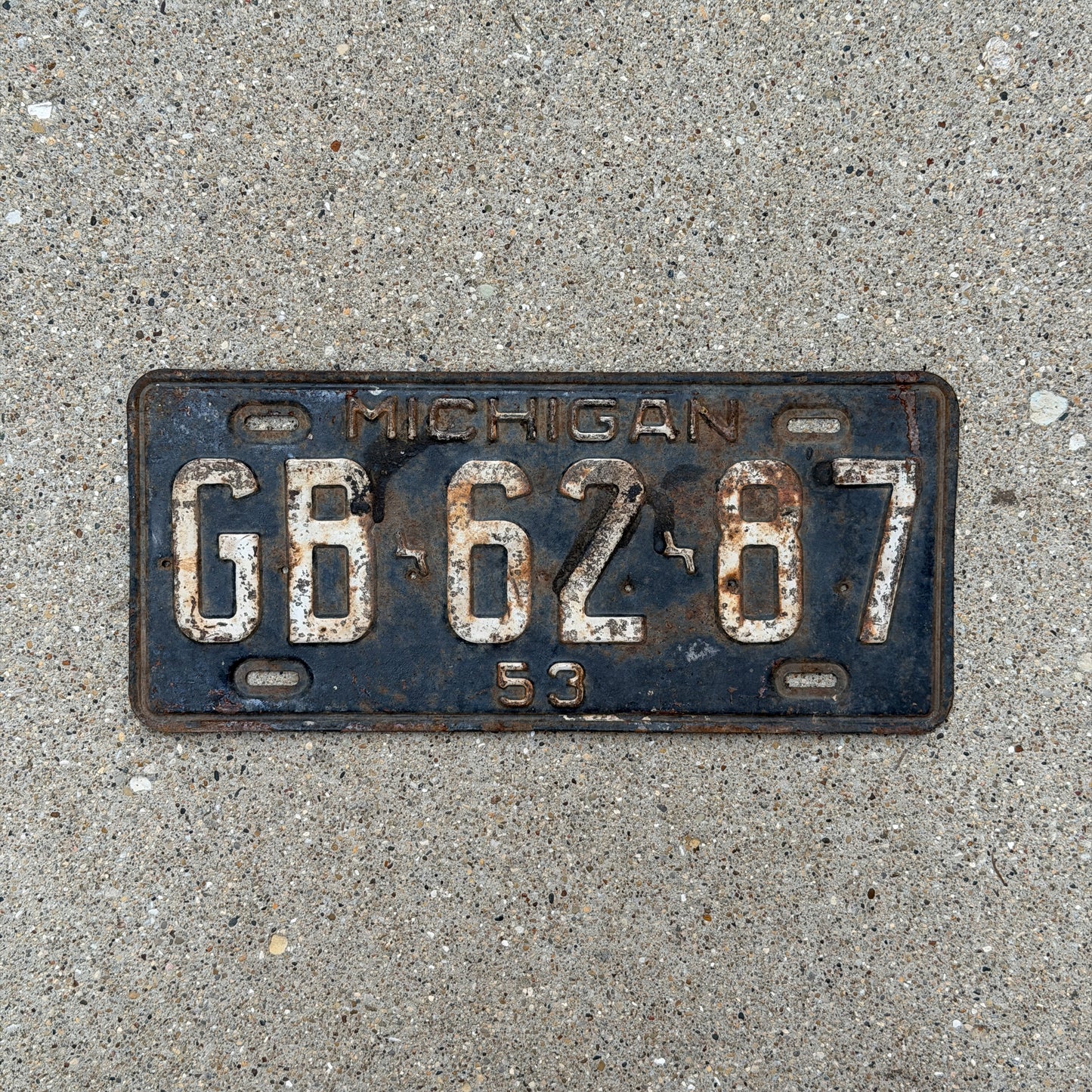 Photo of a 1953 Michigan License Plate Auto Tag Garage Decor Vintage GB 62 87 with original patina