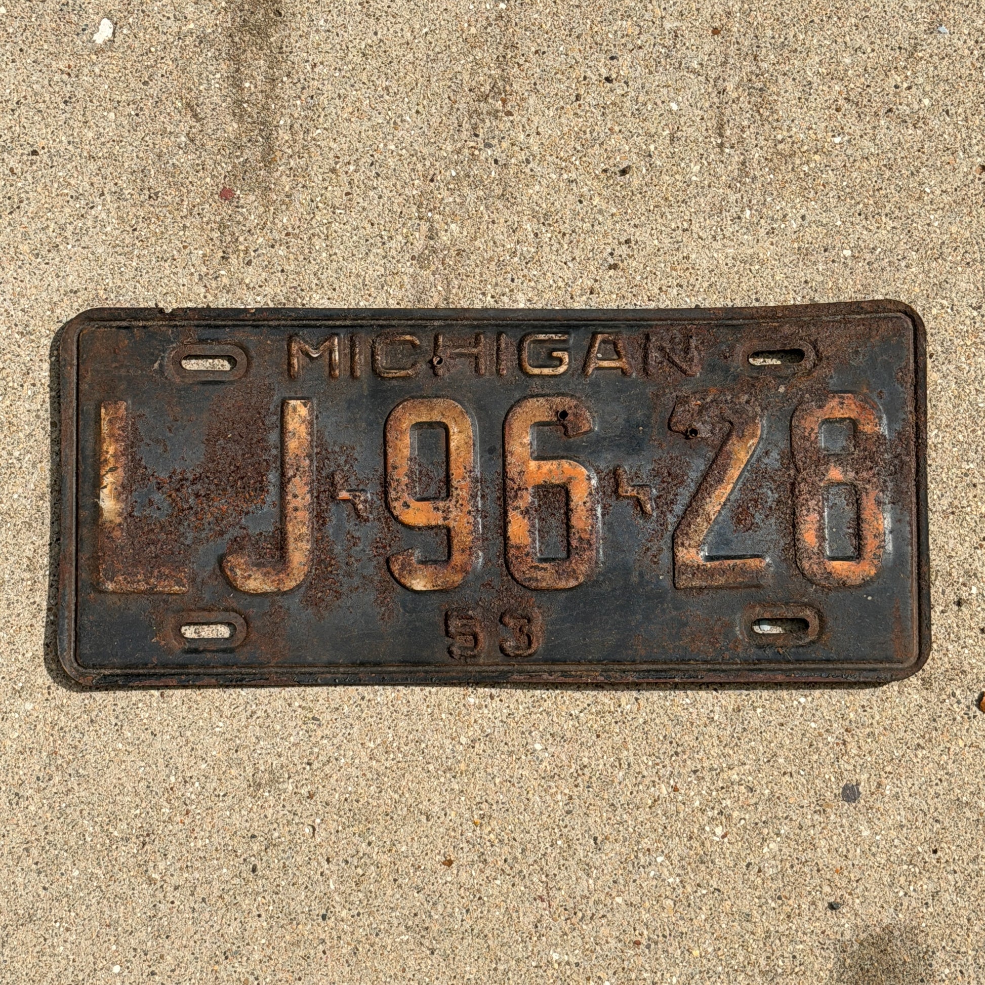 Photo of a 1953 Michigan License Plate Auto Tag Garage Decor Vintage LJ 96 26 with original patina