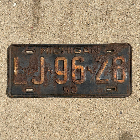 Photo of a 1953 Michigan License Plate Auto Tag Garage Decor Vintage LJ 96 26 with original patina