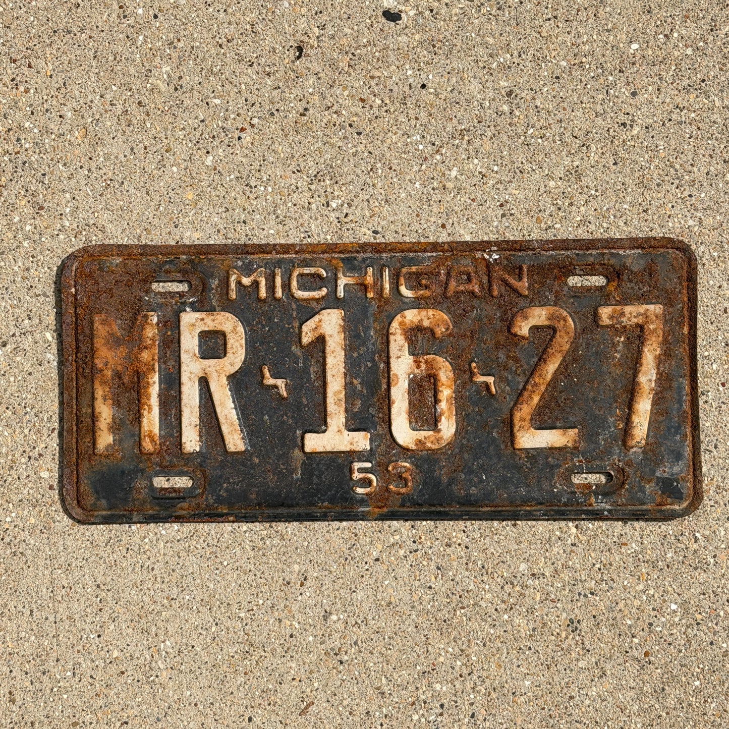 Photo of a 1953 Michigan License Plate Auto Tag Garage Decor Vintage MR 16 27 with original patina