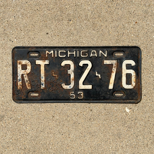 Photo of a 1953 Michigan License Plate Auto Tag Garage Decor Vintage RT 32 76 with original patina
