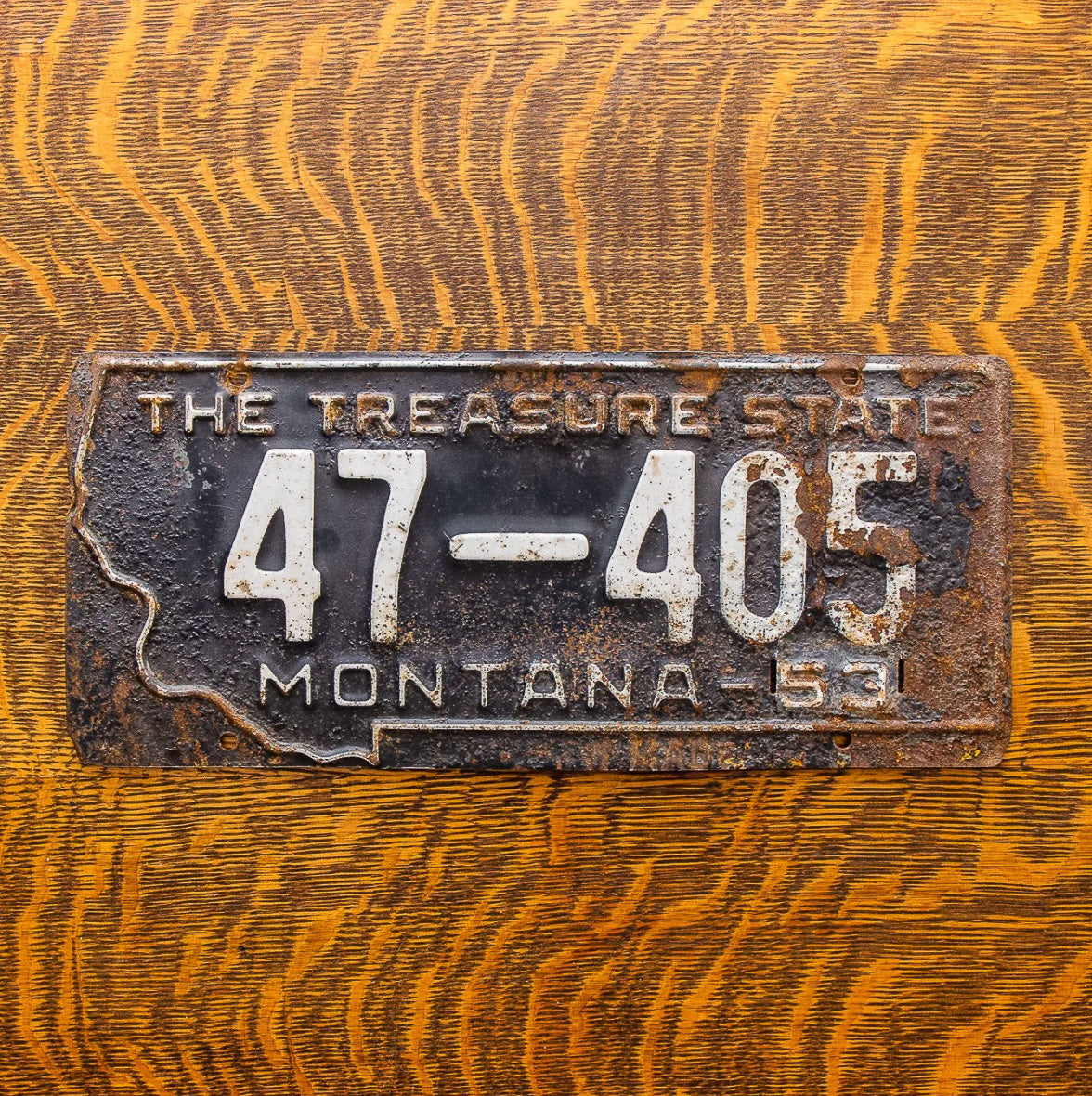 Photo of a 1953 Montana License Plate Auto Tag Garage Decor Vintage State Shape 47 405 with original patina