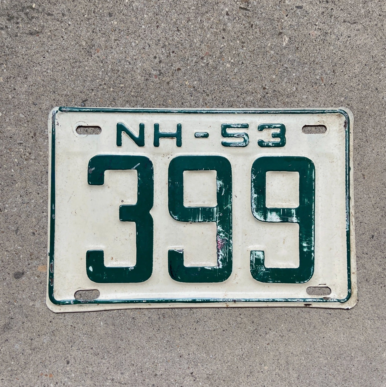 Photo of a 1953 New Hampshire License Plate Auto Tag Garage Decor Vintage Low Number Three Digit 399 with original patina