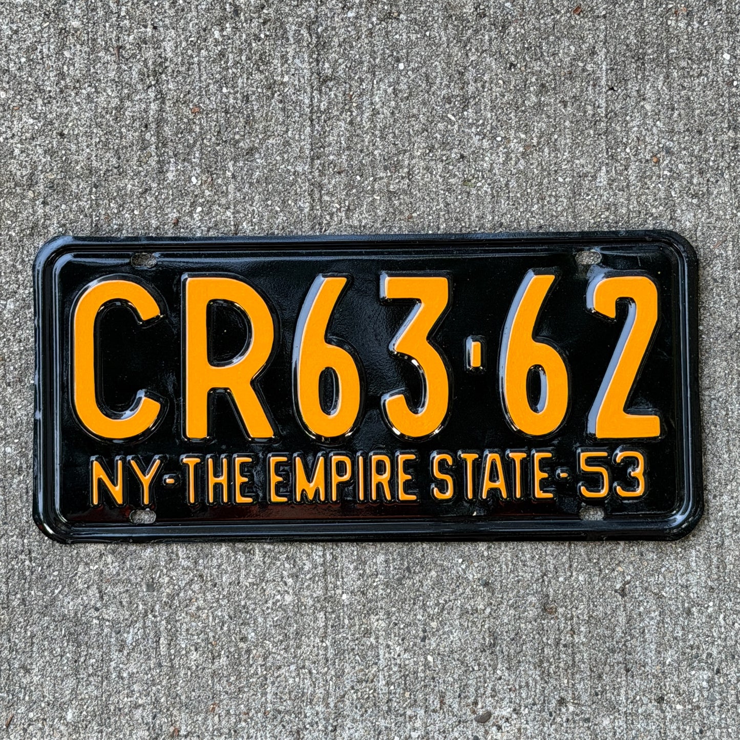 Photo of a 1953 New York License Plate Auto Tag Garage Decor Vintage DMV Clear Number Single Plate Year CR 63 62 with original patina