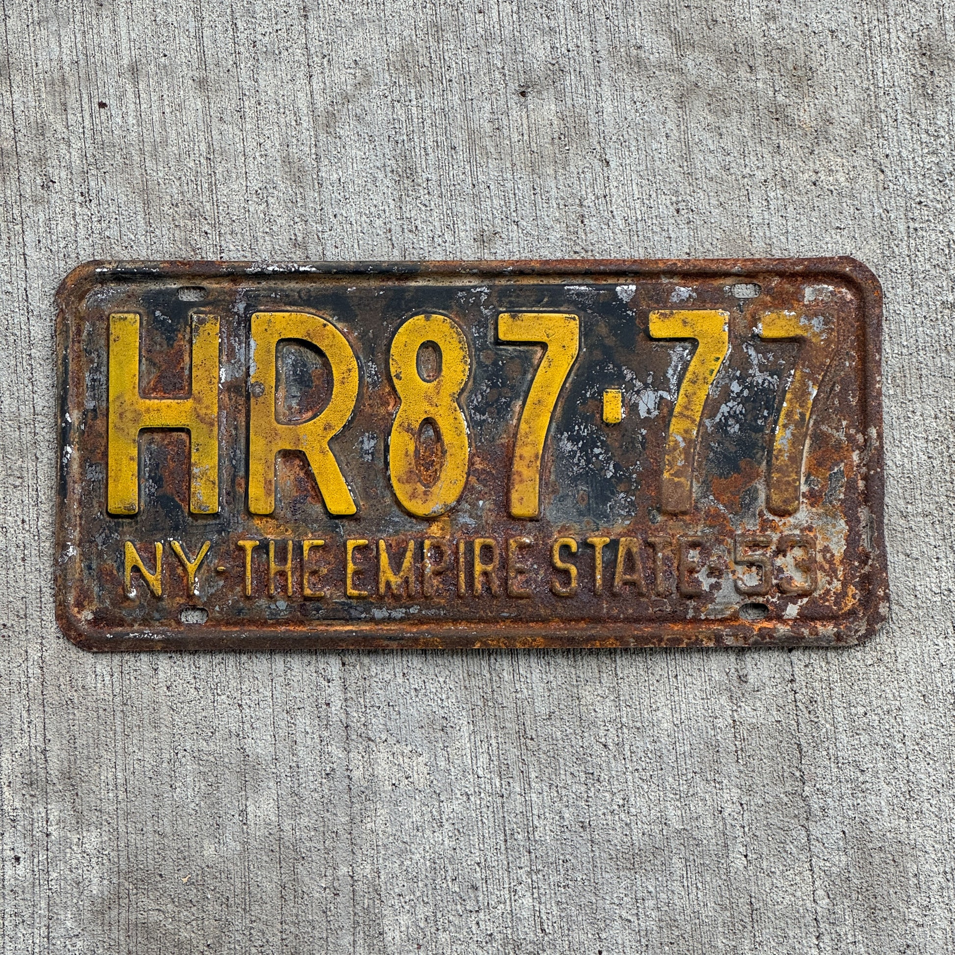 Photo of a 1953 New York License Plate Auto Tag Garage Decor Vintage Lucky 7 Repeat Repeating HR 87 77 with original patina