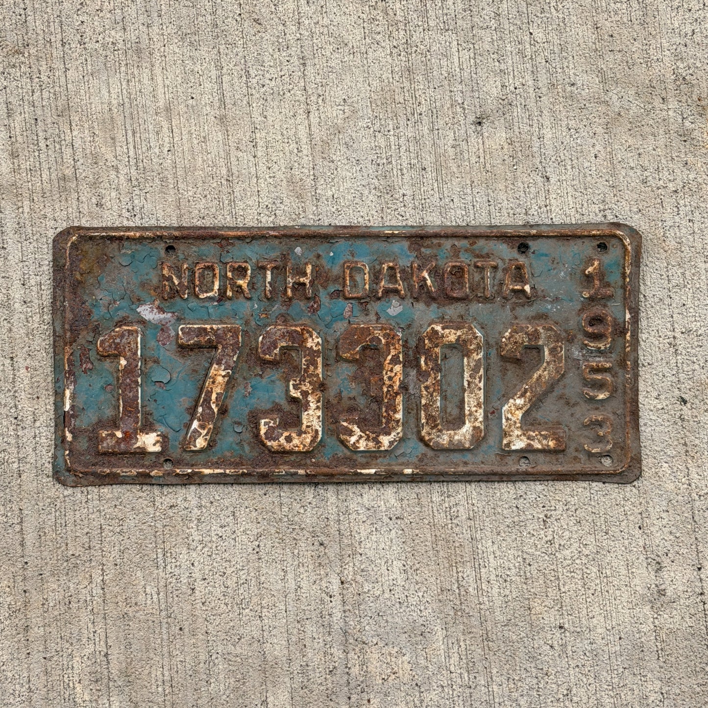 Photo of a 1953 North Dakota License Plate Auto Tag Garage Decor Vintage 173 302 with original patina