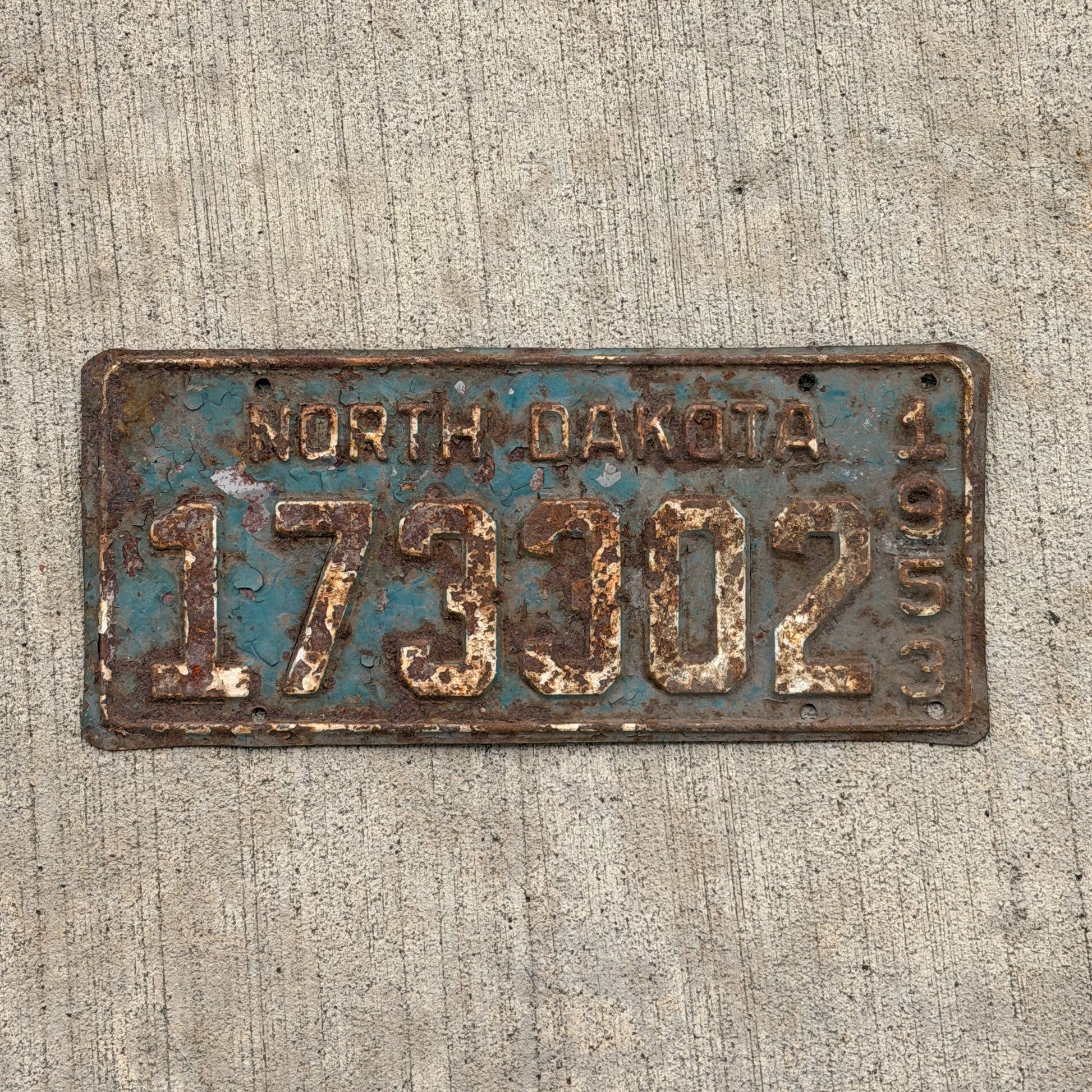 Photo of a 1953 North Dakota License Plate Auto Tag Garage Decor Vintage 173 302 with original patina