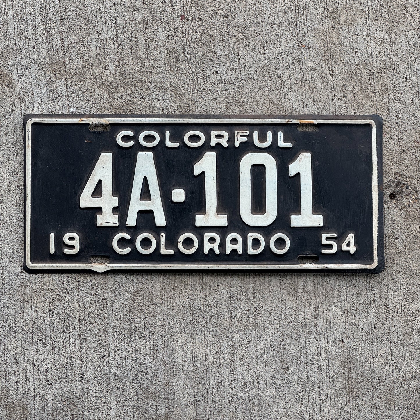 Photo of a 1954 Colorado License Plate Auto Tag Garage Decor Vintage 4A 101 with original patina