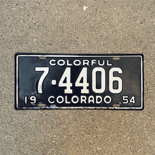 Photo of a 1954 Colorado License Plate Auto Tag Garage Decor Vintage 7 4406 with original patina