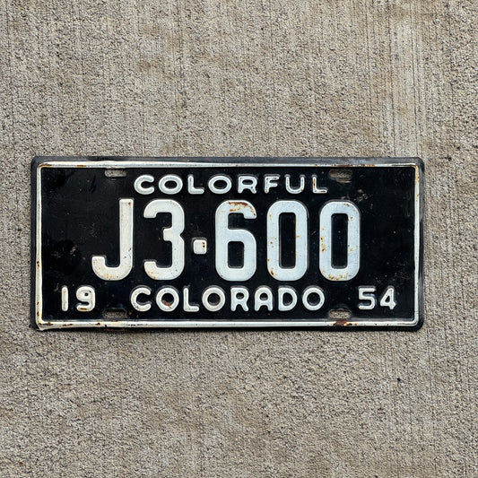 Photo of a 1954 Colorado License Plate Auto Tag Garage Decor Vintage J3 600 with original patina