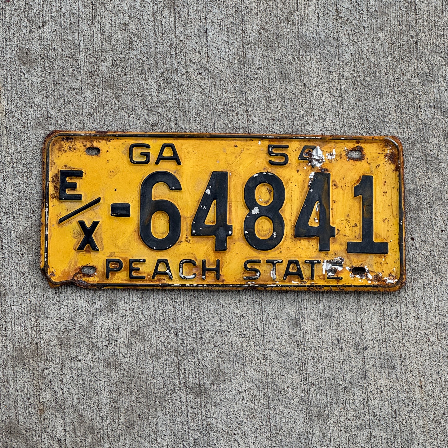 Photo of a 1954 Georgia License Plate Auto Tag Garage Decor Vintage EX 64841 with original patina