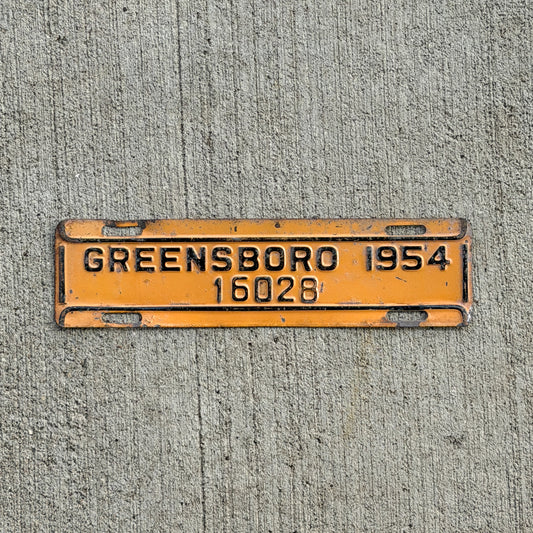 Photo of a 1954 Greensboro North Carolina License Plate Topper Auto Tag Garage Decor Vintage
 16028 with original patina