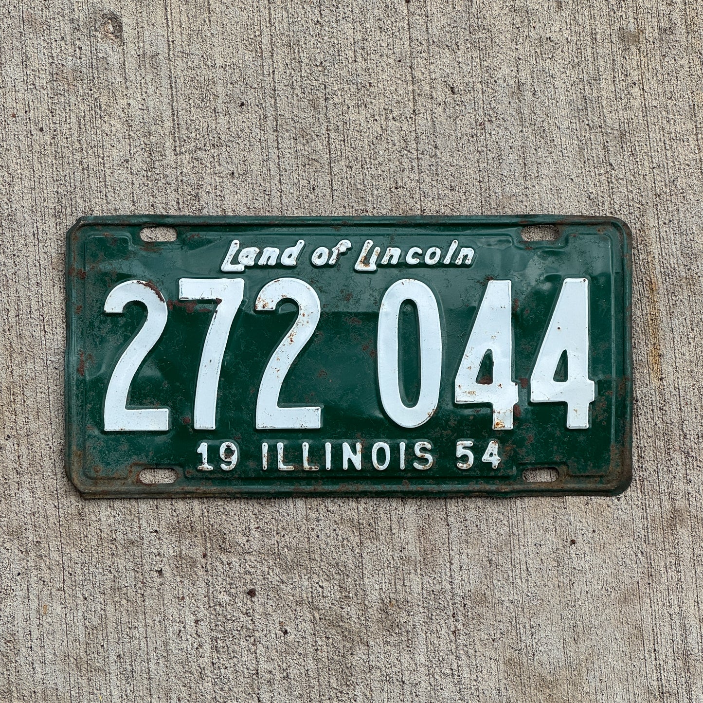 Photo of a 1954 Illinois License Plate Auto Tag Garage Decor Vintage 272 044 with original patina