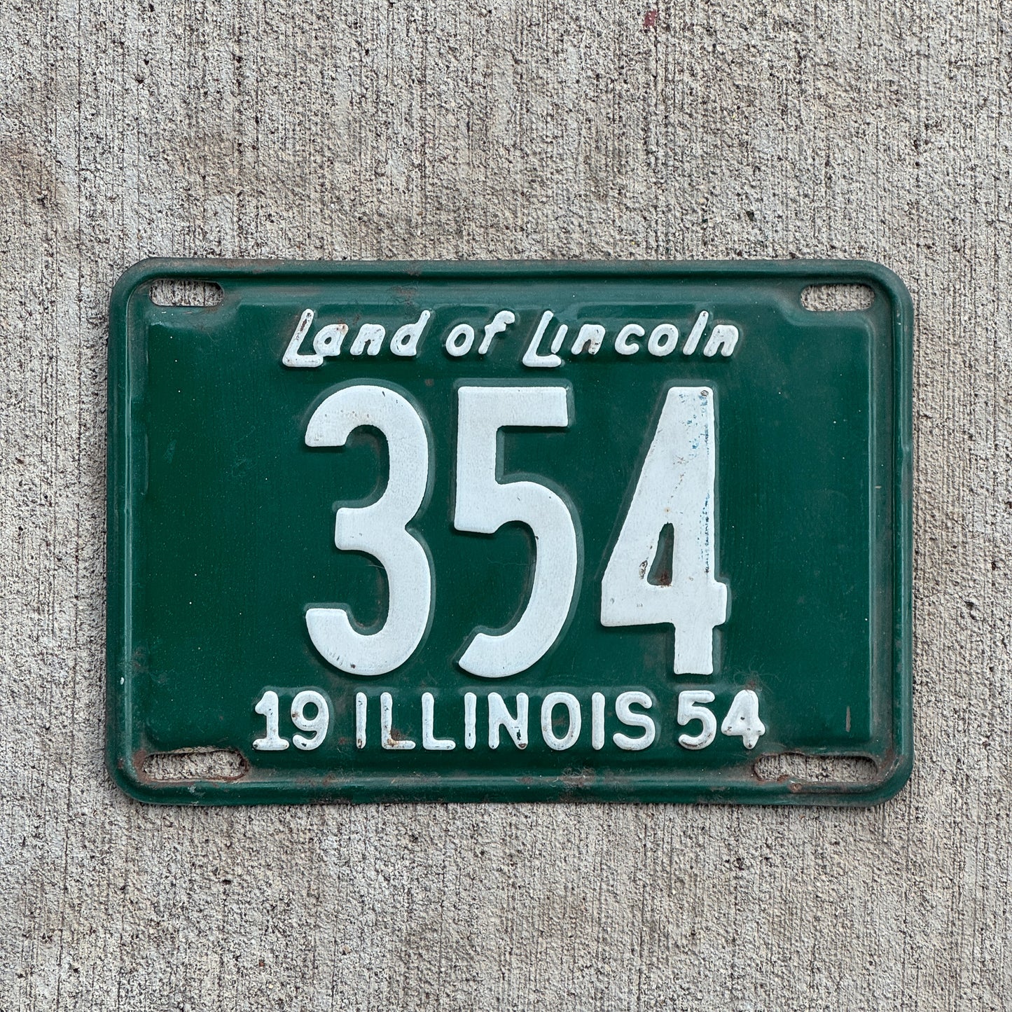 Photo of a 1954 Illinois License Plate Auto Tag Garage Decor Vintage Low Number Three Digit 354 with original patina