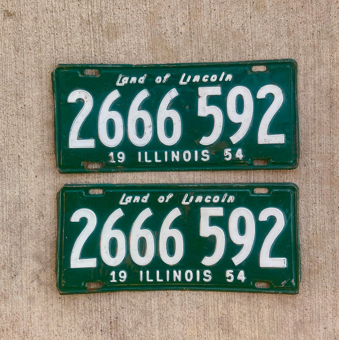 Photo of a 1954 Illinois License Plate Pair Auto Tag Garage Decor Vintage 666 Devil Evil 2666 592 with original patina