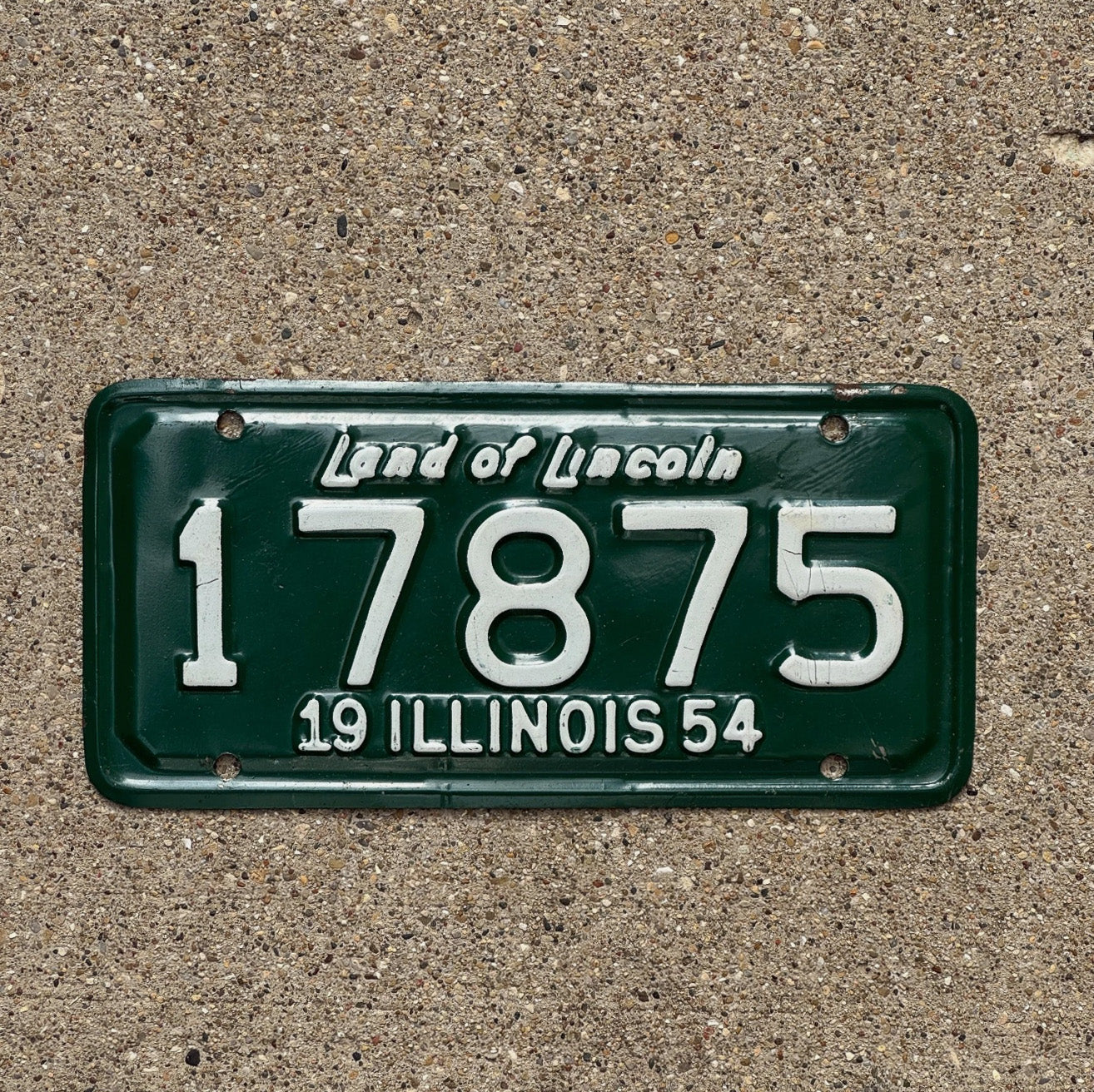 Photo of a 1954 Illinois Motorcycle License Plate Auto Tag Garage Decor Vintage 17875 with original patina