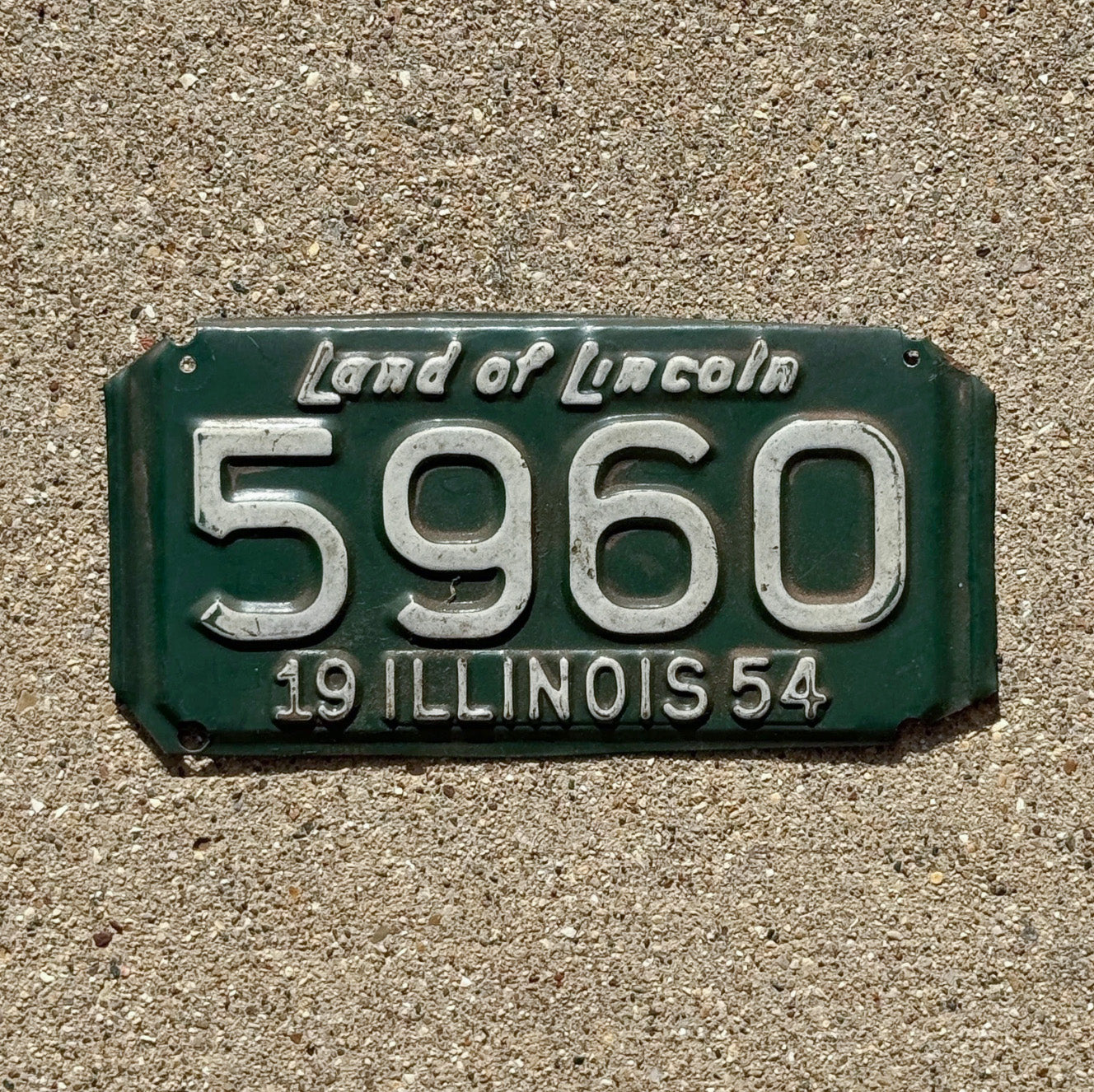 Photo of a 1954 Illinois Motorcycle License Plate Auto Tag Garage Decor Vintage 5960 with original patina