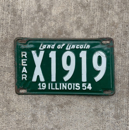 Photo of a 1954 Illinois Truck License Plate Auto Tag Garage Decor Vintage Rear Nice Number X 1919 with original patina