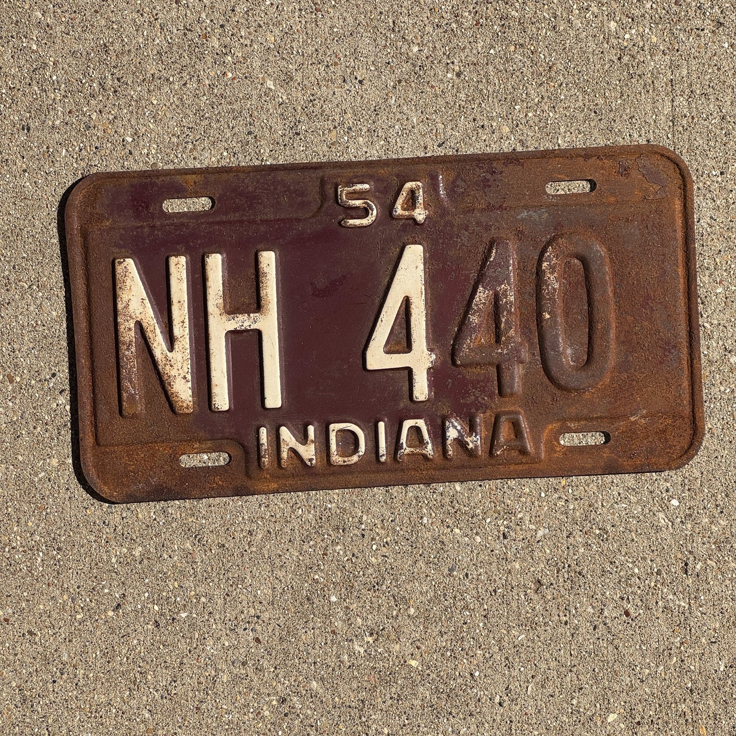 Photo of a 1954 Indiana License Plate Auto Tag Garage Decor Vintage NH 440