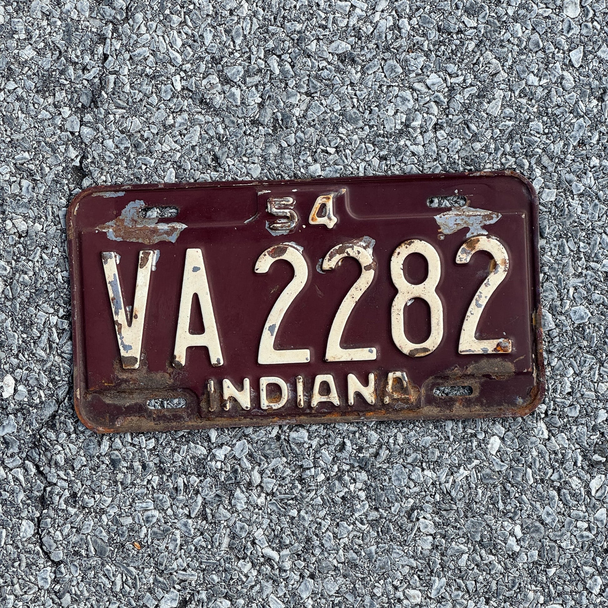 Photo of a 1954 Indiana License Plate Auto Tag Garage Decor Vintage VA 2282