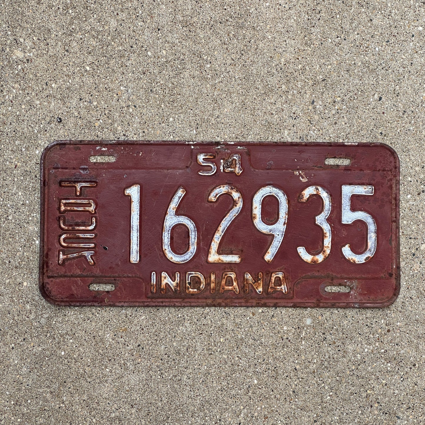 Photo of a 1954 Indiana Truck License Plate Auto Tag Garage Decor Vintage 162935