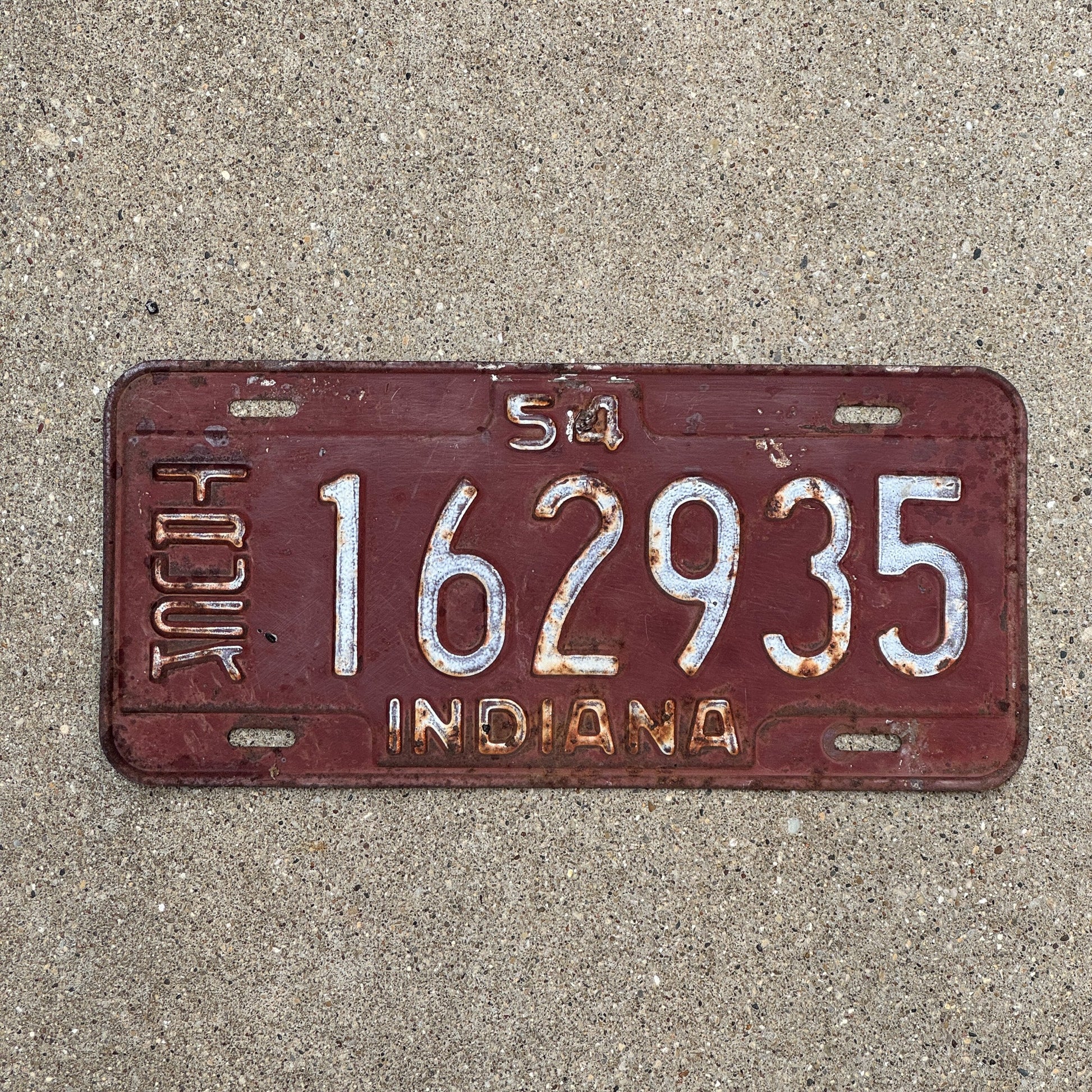Photo of a 1954 Indiana Truck License Plate Auto Tag Garage Decor Vintage 162935
