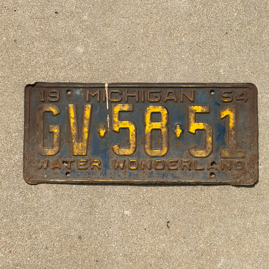 Photo of a 1954 Michigan License Plate Auto Tag Garage Decor Vintage GV 58 51 with original patina