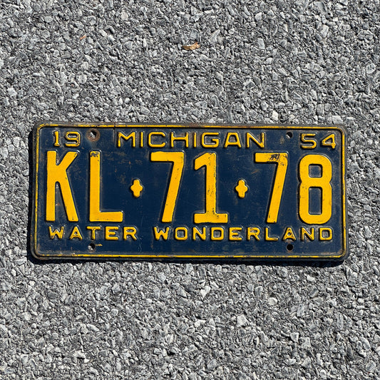 Photo of a 1954 Michigan License Plate Auto Tag Garage Decor Vintage KL7178