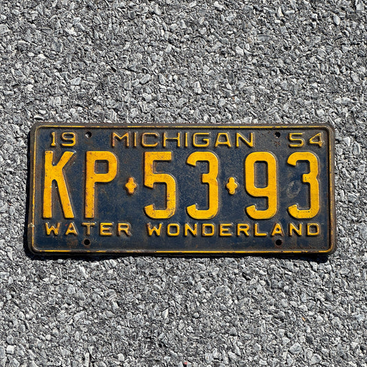 Photo of a 1954 Michigan License Plate Auto Tag Garage Decor Vintage KP 5393