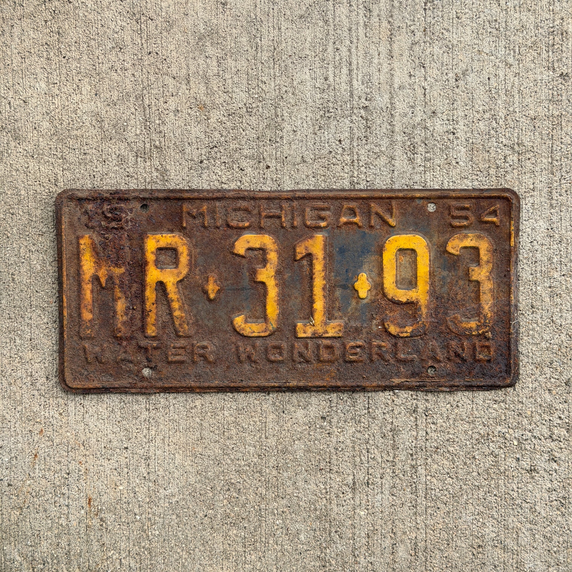 Photo of a 1954 Michigan License Plate Auto Tag Garage Decor Vintage MR 31 93 with original patina