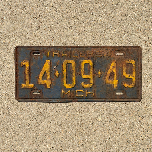 Photo of a 1954 Michigan Trailer License Plate Auto Tag Garage Decor Vintage 14 09 49 with original patina