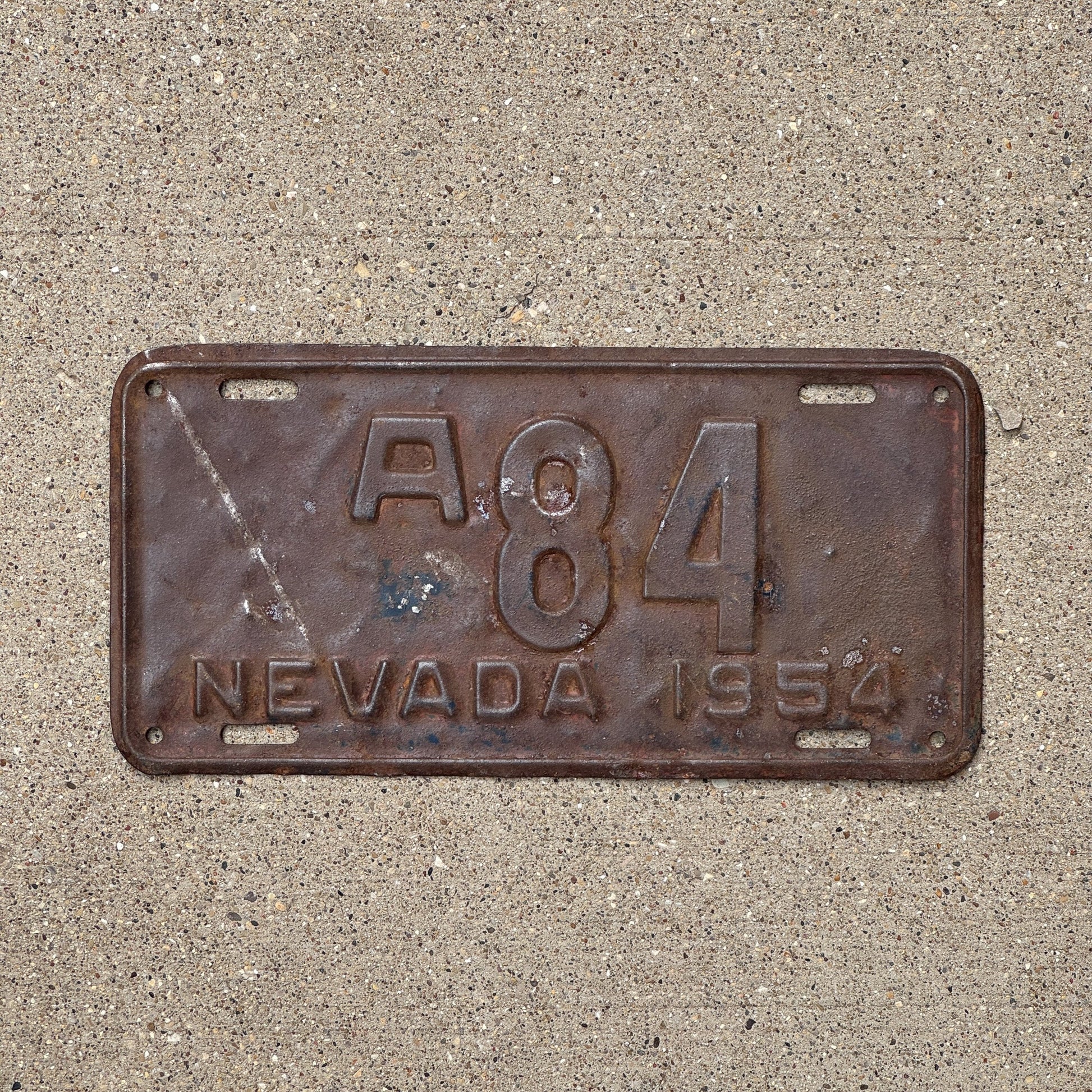 Photo of a 1954 Nevada License Plate Auto Tag Garage Decor Vintage Low Number Two Digit A 84