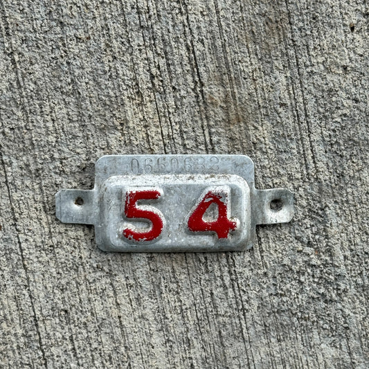 Photo of a 1954 New Jersey Tab License Plate Auto Tag Garage Decor Vintage 0660632 with original patina