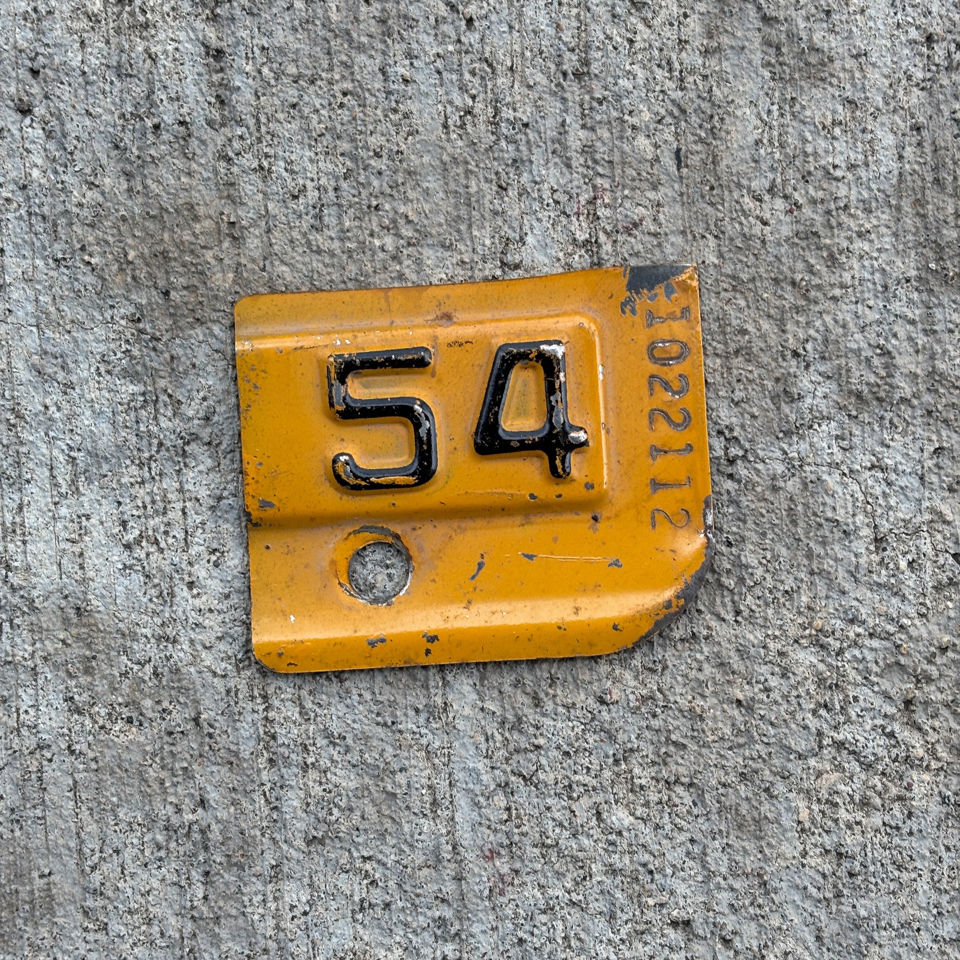 Photo of a 1954 New York Tab License Plate Auto Tag Garage Decor Vintage 1022112 with original patina