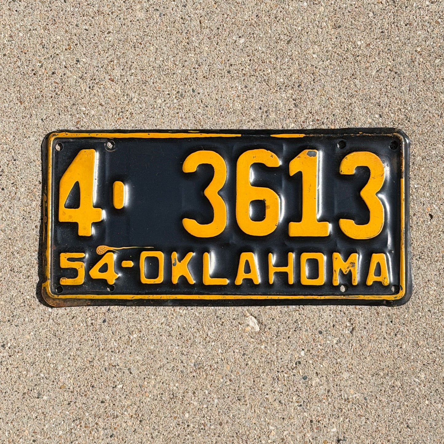Photo of a 1954 Oklahoma License Plate Auto Tag Garage Decor Vintage 4 3613 with original patina