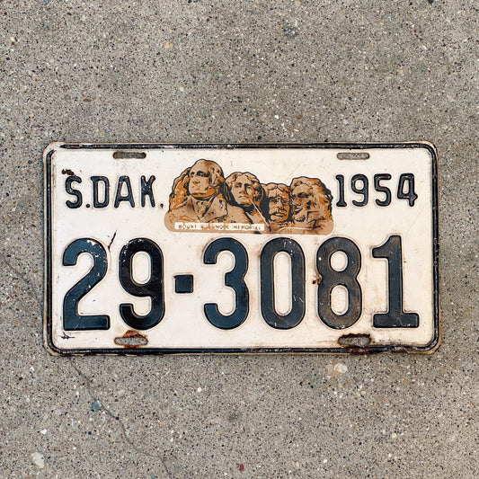 Photo of a 1954 South Dakota License Plate Auto Tag Garage Decor Vintage Mount Rushmore 29 3081 with original patina
