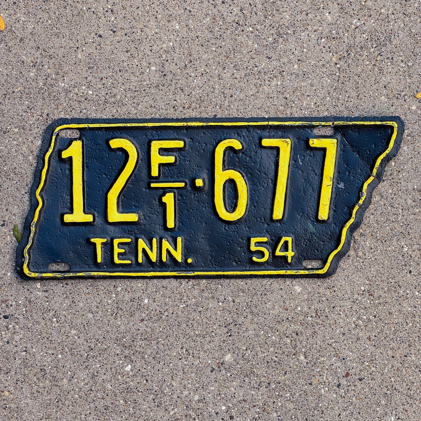 Photo of a 1954 Tennessee Farm License Plate Auto Tag Garage Decor Vintage State Shape 12 F1 677