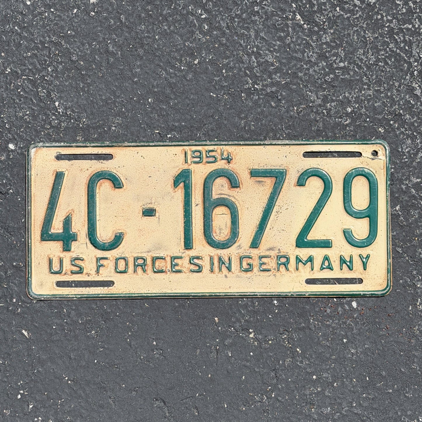 Photo of a 1954 US Forces Germany License Plate Auto Tag Garage Decor Vintage 4C 16729 with original patina