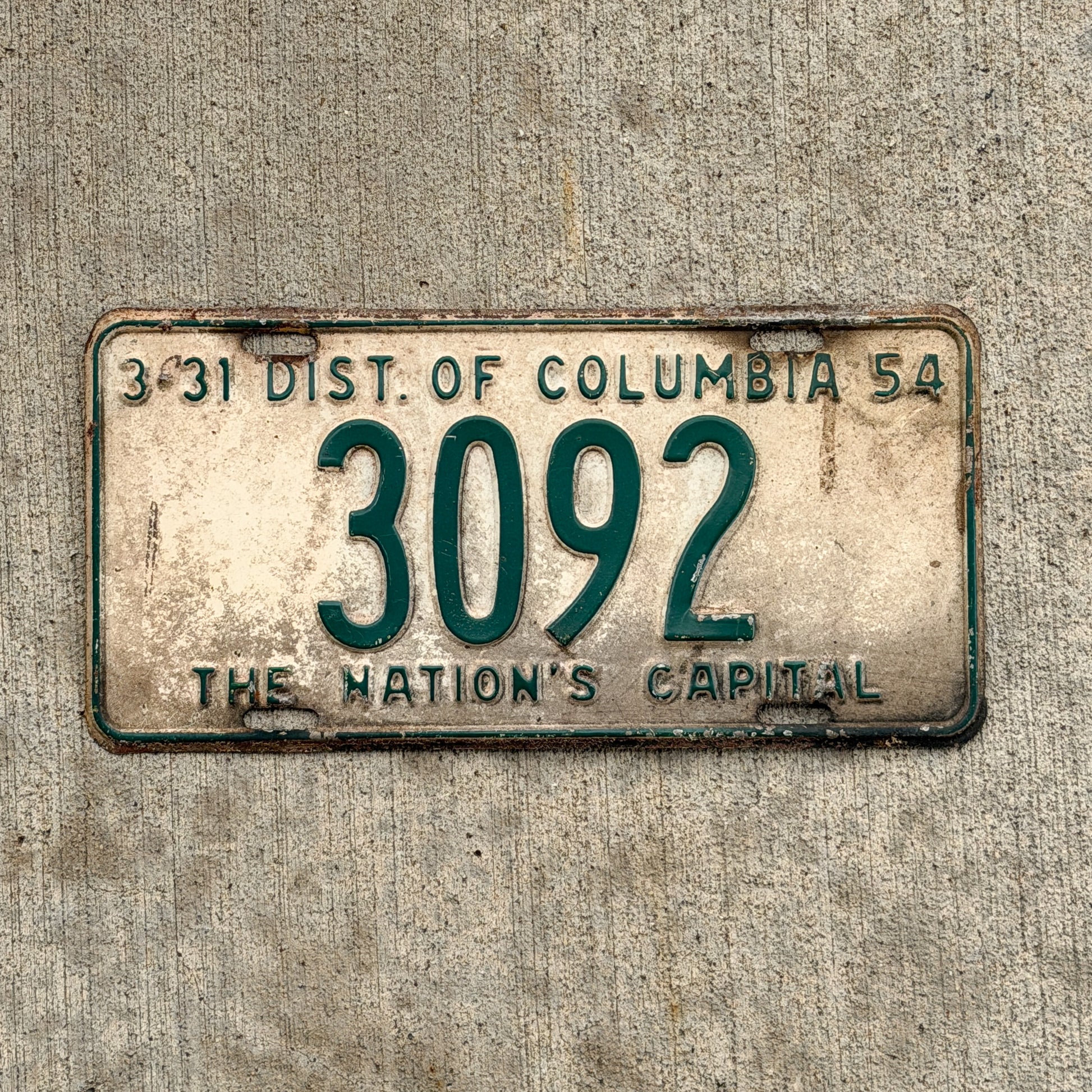 Photo of a 1954 Washington DC License Plate Auto Tag 1 Vintage Garage Low Number Four Digit 3092 with original patina
