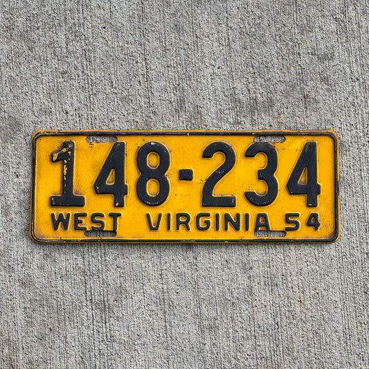 Photo of a 1954 West Virginia License Plate Auto Tag Garage Decor Vintage 148 234 with original patina