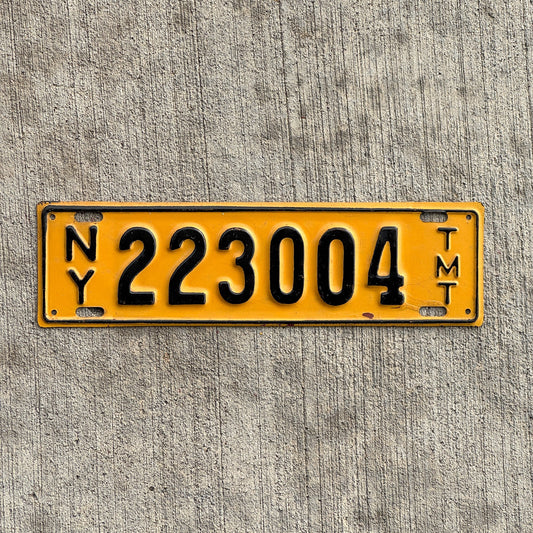 Photo of a 1955 1957 New York Truck Mile Tax License Plate Auto Tag Garage Decor Vintage Series 2 223004 with original patina