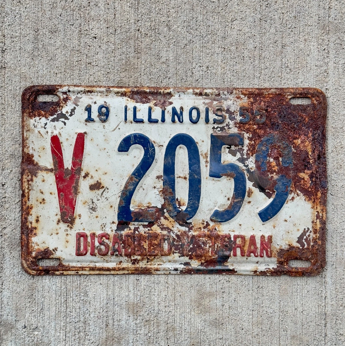 Photo of a 1955 Illinois Disabled Veteran License Plate Auto Tag 1 Garage Decor DAV V 2059