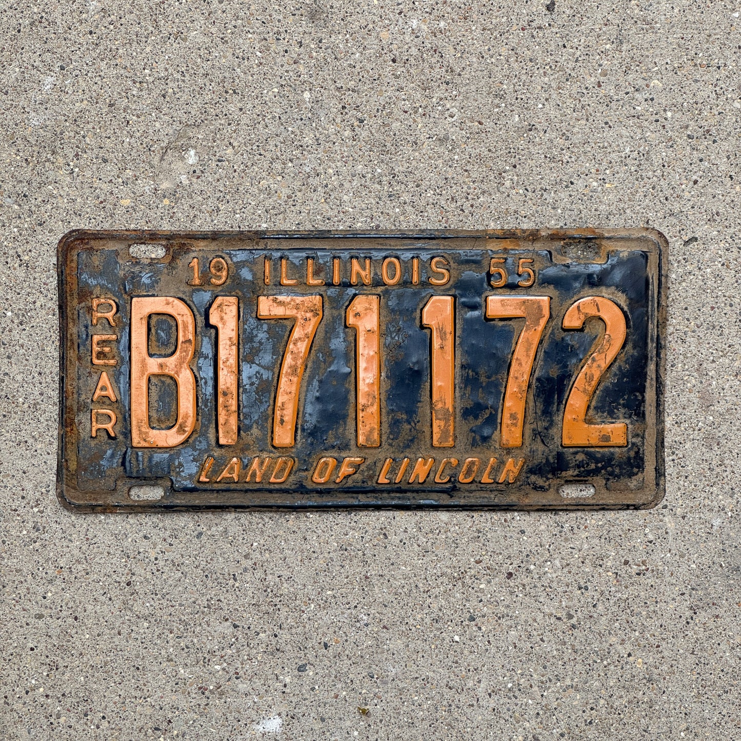 Photo of a 1955 Illinois Truck License Plate Auto Tag 1 Vintage Garage Rear Plate Orange Blue B 171172 with original patina