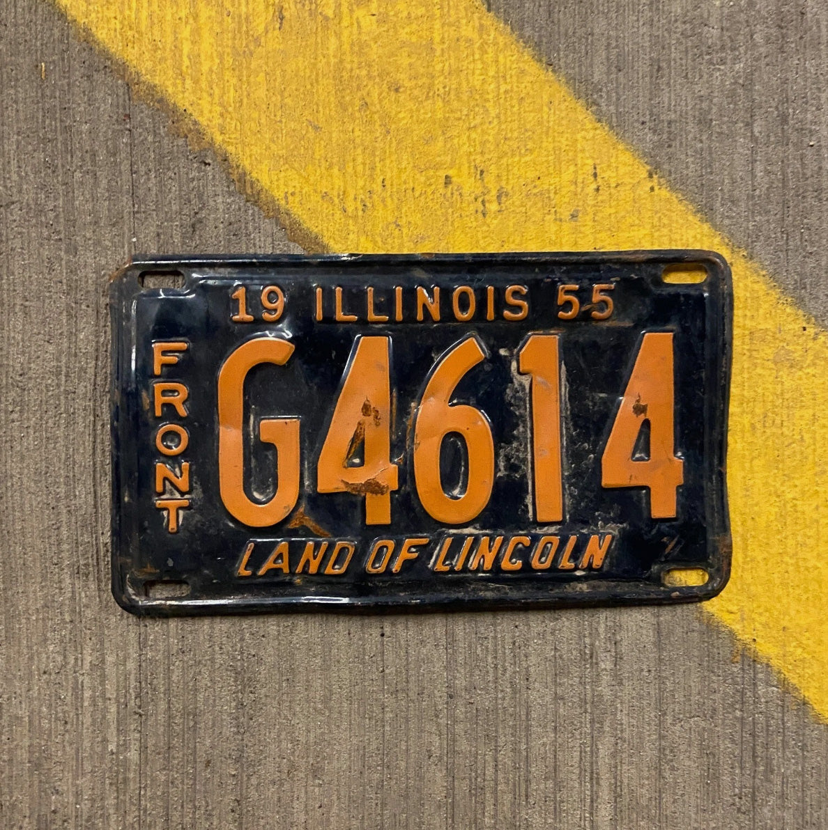 Photo of a 1955 Illinois Truck License Plate Auto Tag Garage Decor Orange Blue G 4614