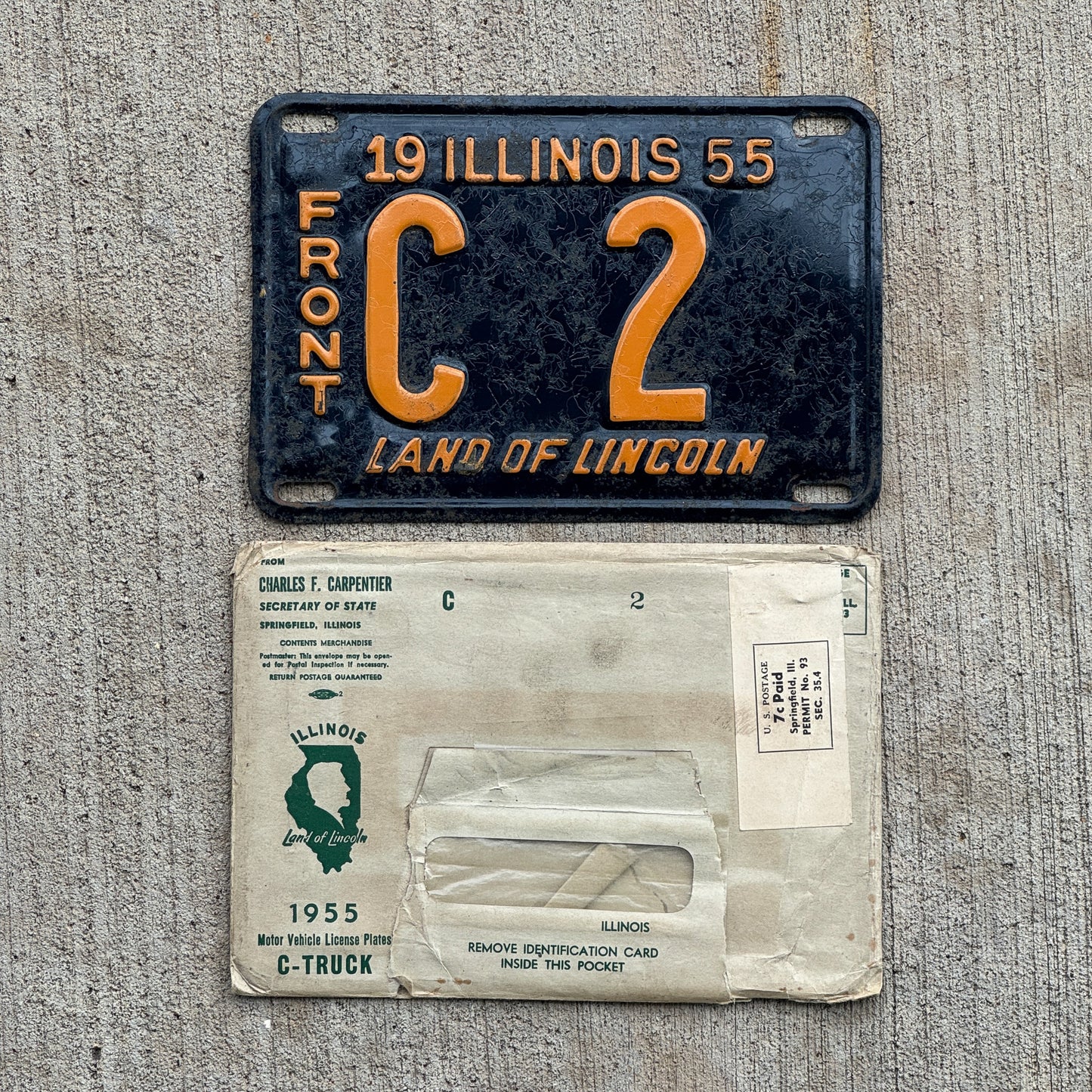 Photo of a 1955 Illinois Truck License Plate Auto Tag Garage Decor Vintage Low Number Single Digit C 2 with original patina
