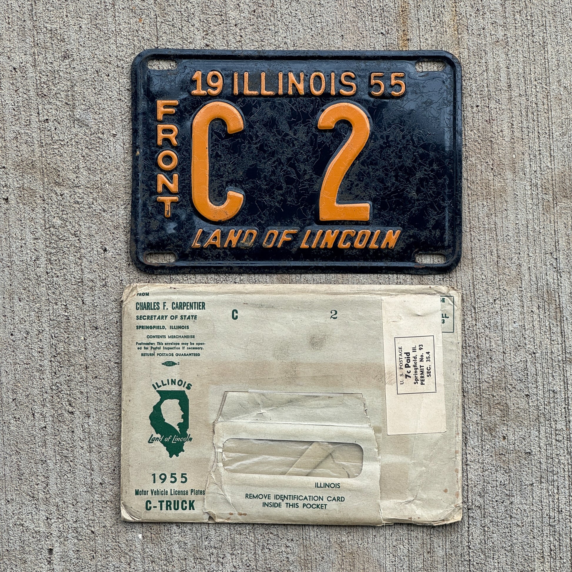 Photo of a 1955 Illinois Truck License Plate Auto Tag Garage Decor Vintage Low Number Single Digit C 2 with original patina